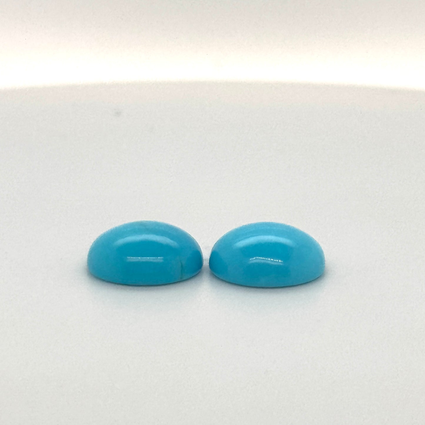 Kingman Pair of (2) Turquoise Stones - Clean - Matching Round Cabs